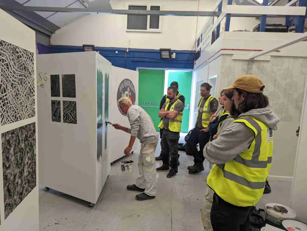 Barry Caple Shows A Number Of Bagnalls Apprentices A Painting Technique