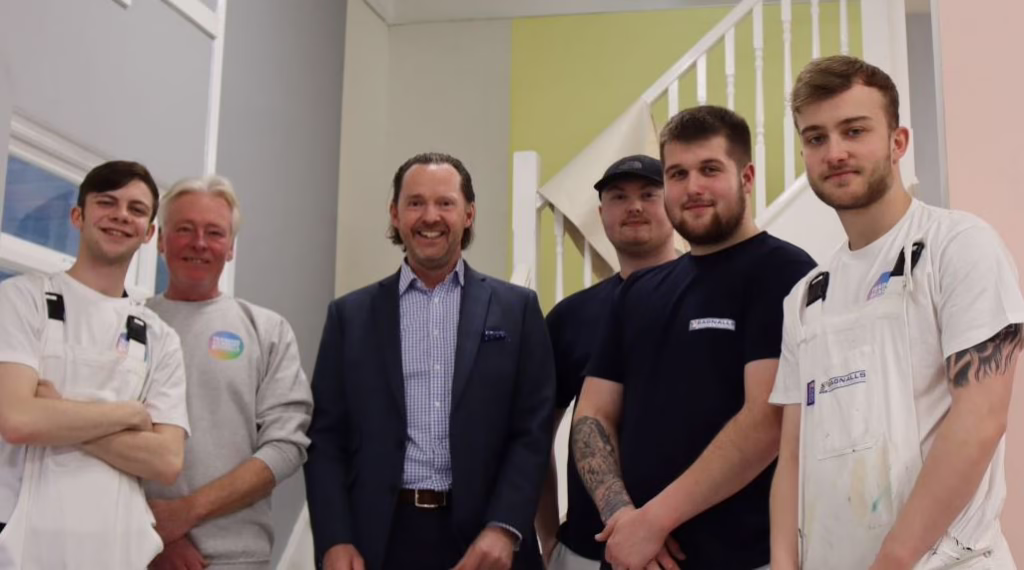 Stephen Bagnall Stands With Five Bagnalls Team Members