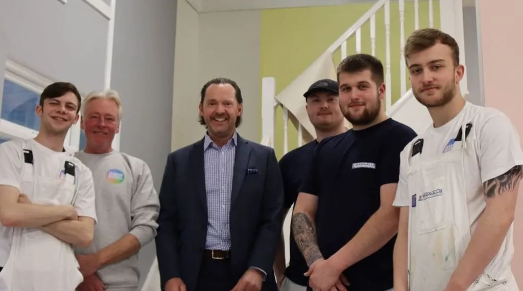 Stephen Bagnall Stands With Five Bagnalls Team Members