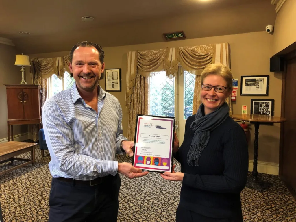 Stephen Bagnall Presenting Becky Slater With Her RoSPA Workplace Champion Framed Certificate