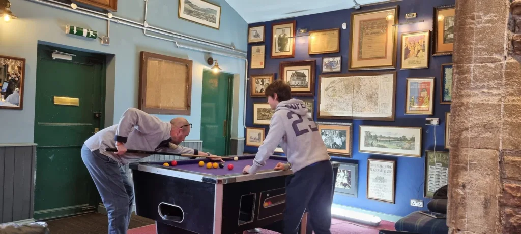Two People Playing Pool In The Redecorated Blagdon Village Club