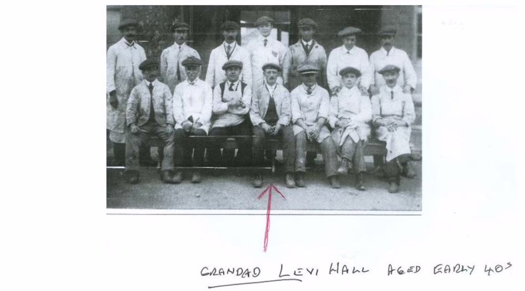 A Black And White Photo Of Workers With An Arrow Identifying A Man Referred To As Grandad Levi Hall