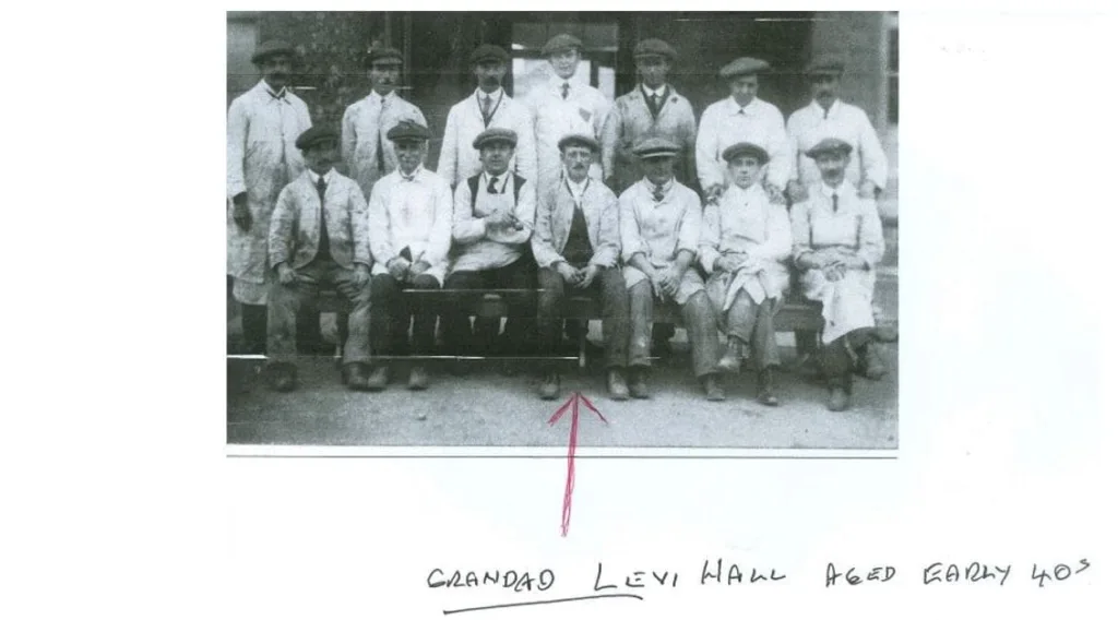 A Black And White Photo Of Workers With An Arrow Identifying A Man Referred To As Grandad Levi Hall