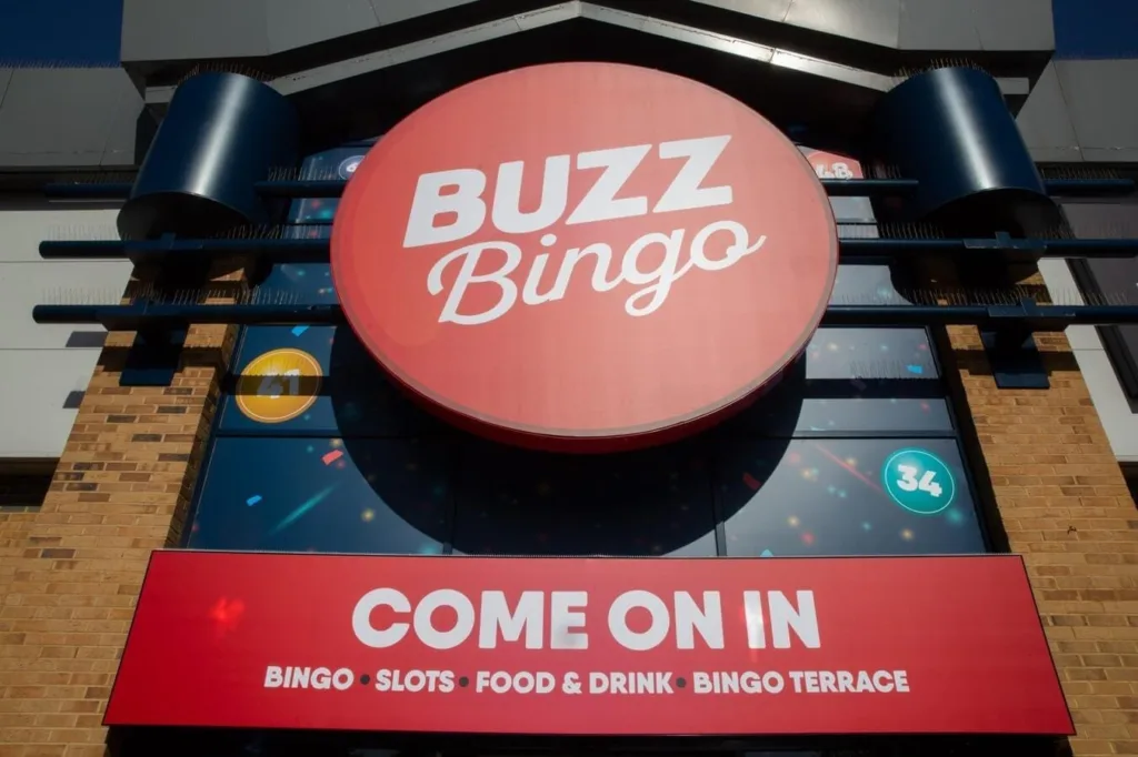 An Exterior Shot Of A Building With The Buzz Bingo Sign