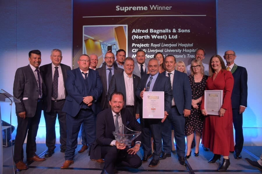 Seventeen Members Of The Bagnalls Team Collecting The Painting And Decorating Association Supreme Winners Trophy And Framed Certificates
