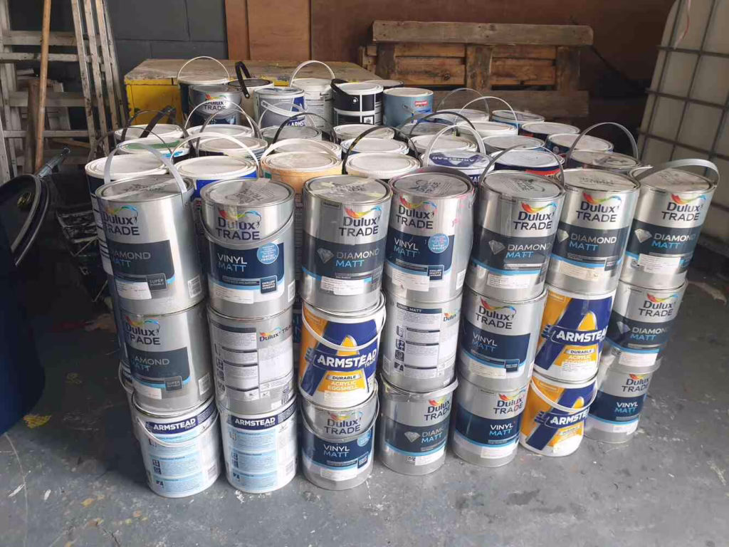 A Stack Of Paint Cans