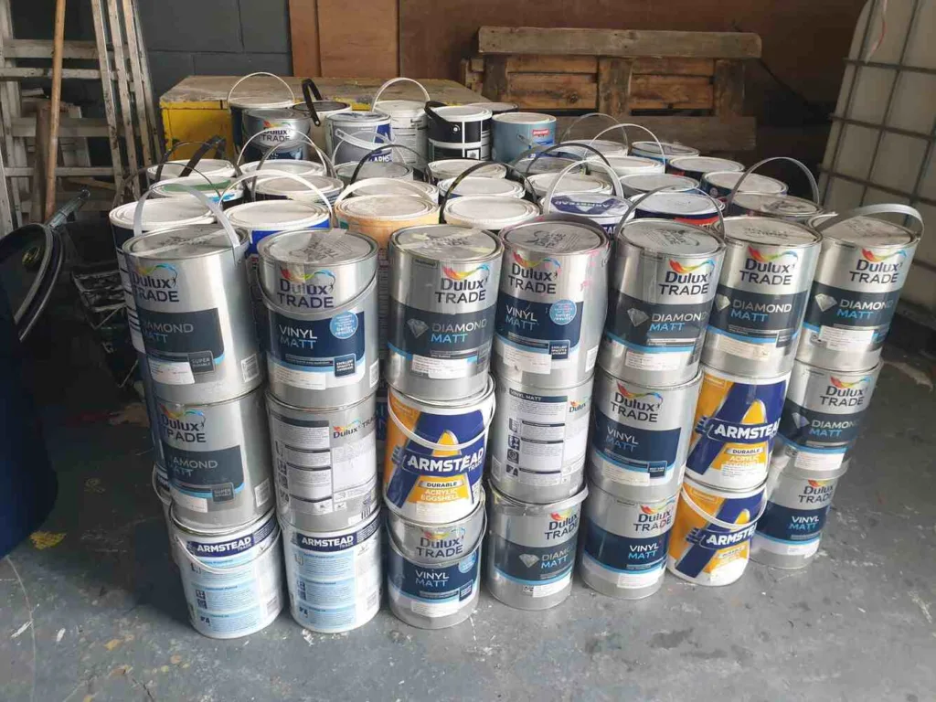 A Stack Of Paint Cans